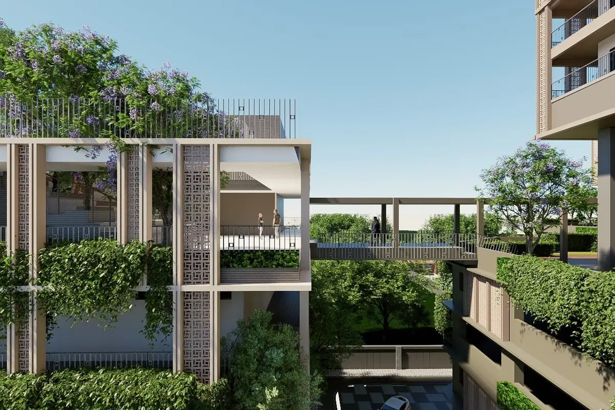Podium level deck with planting between the towers